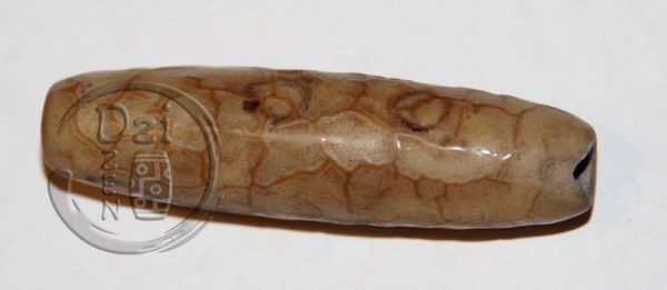 уникальная бусина дзи - особый амулет с рельефными венами